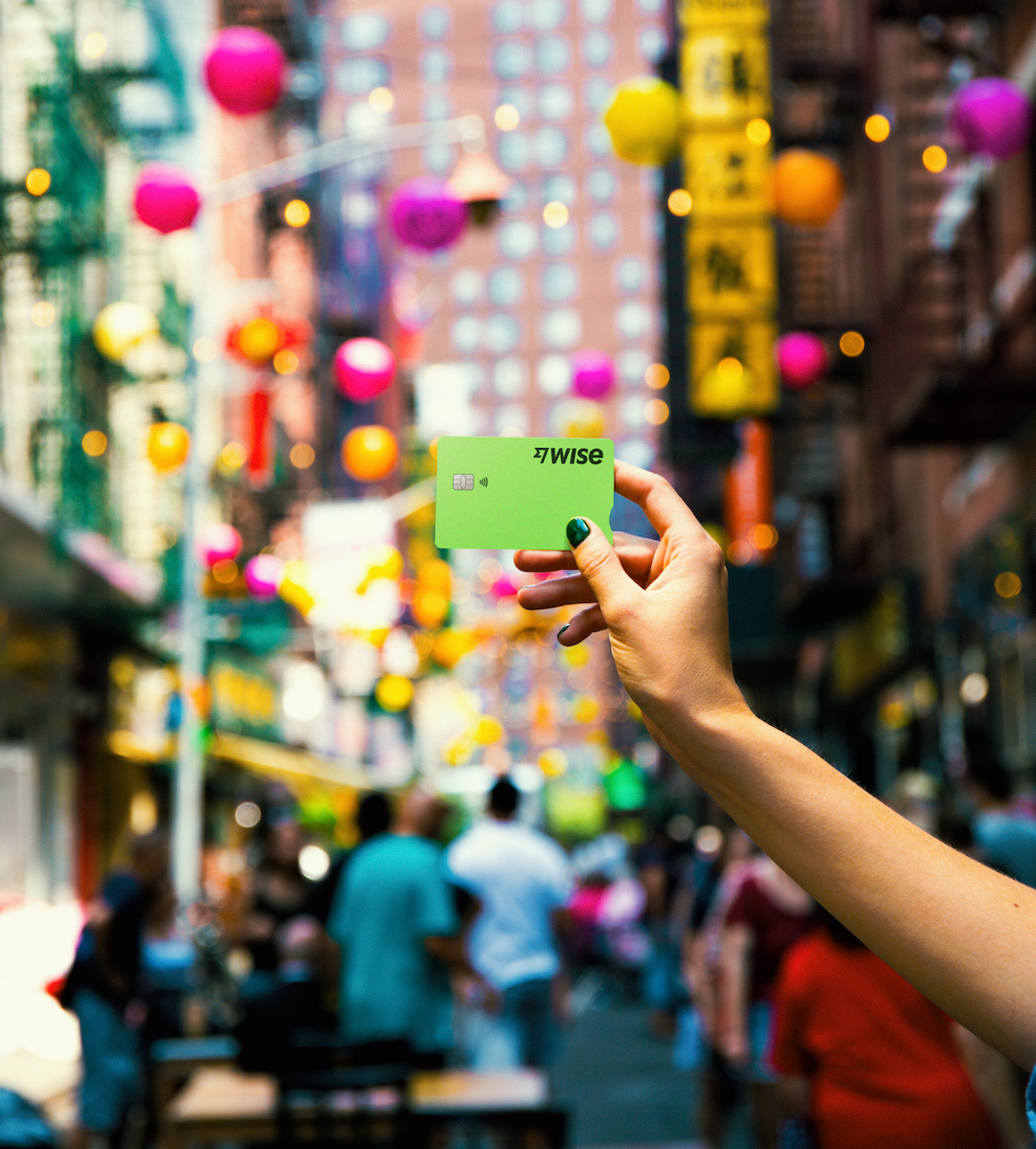 Wise Card in front of a city backdrop