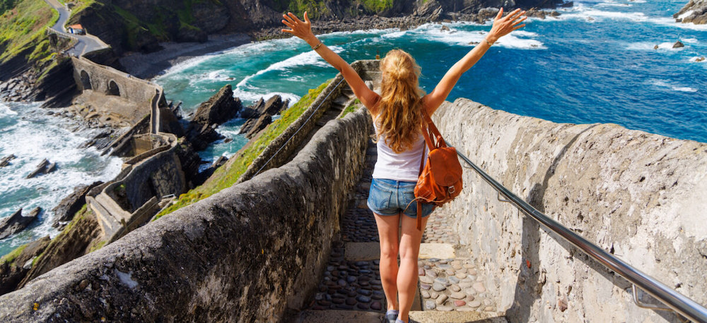 woman-going-down-stairs-near-bilbao-country-basque-spain