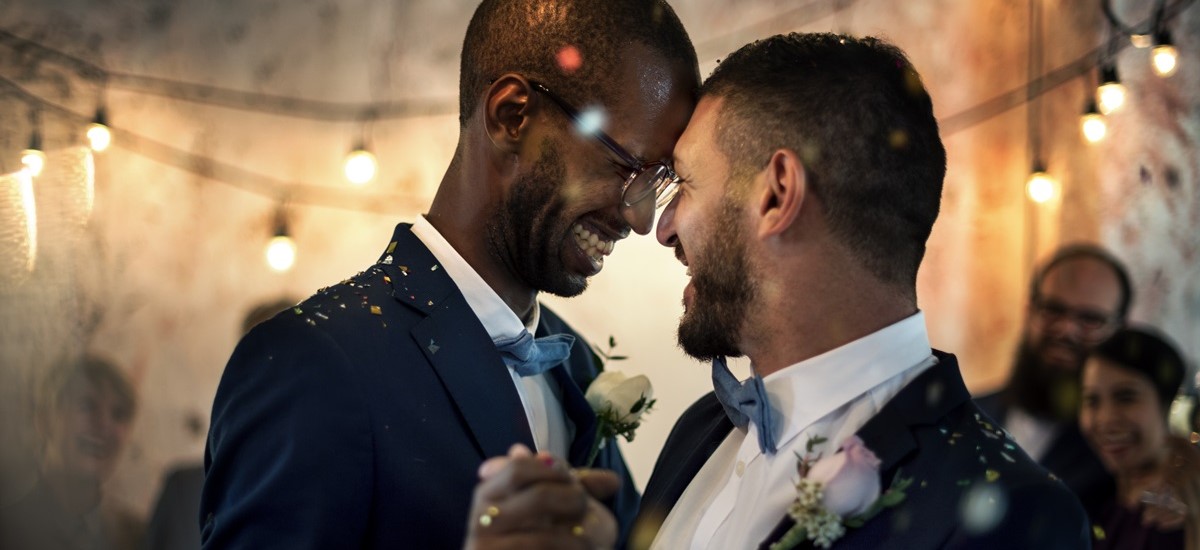 married-same-sex-male-couple-dancing-on-dancefloor