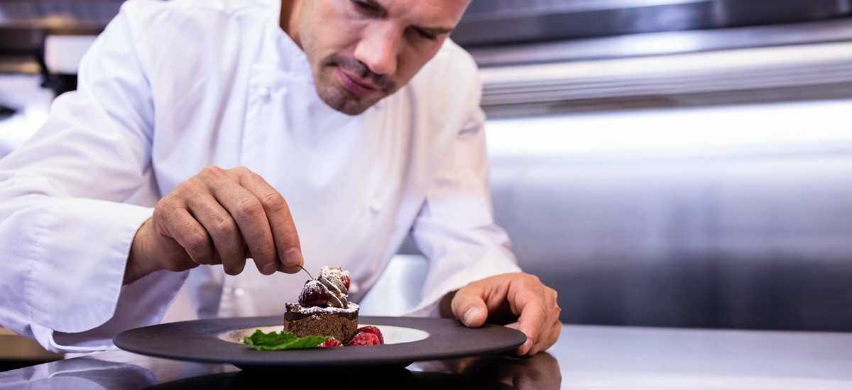 chef plating a dessert
