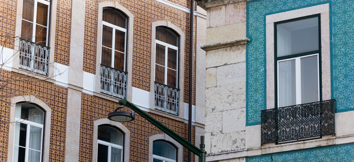 close up of houses on Lisbon showing balconies and tiles