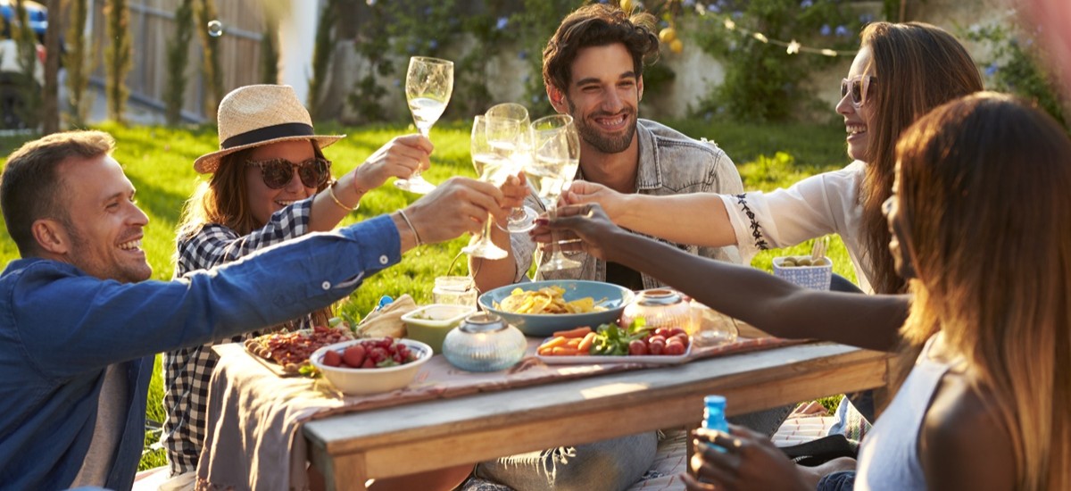 group of friends celebrating over dinner