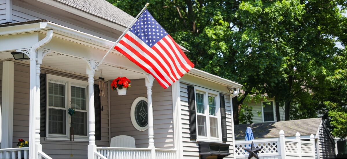 us-flag-waving-outside-of-the-house-in-the-usa