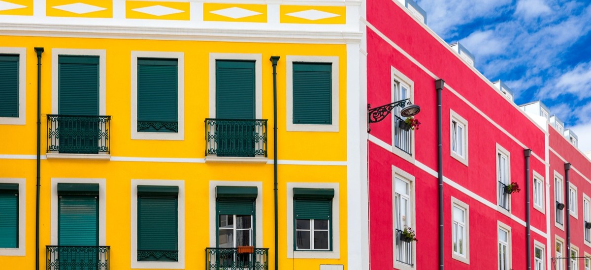 close up of red and yellow buildings in Portugal