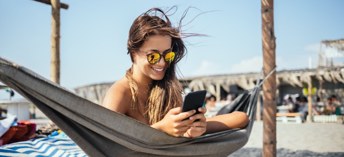woman-on-phone-beach