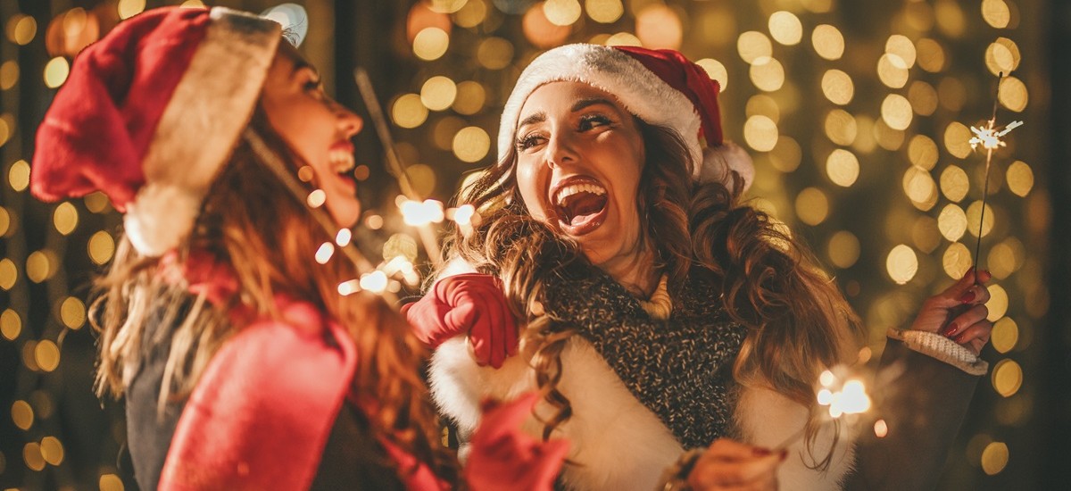 two women celebrating Christmas