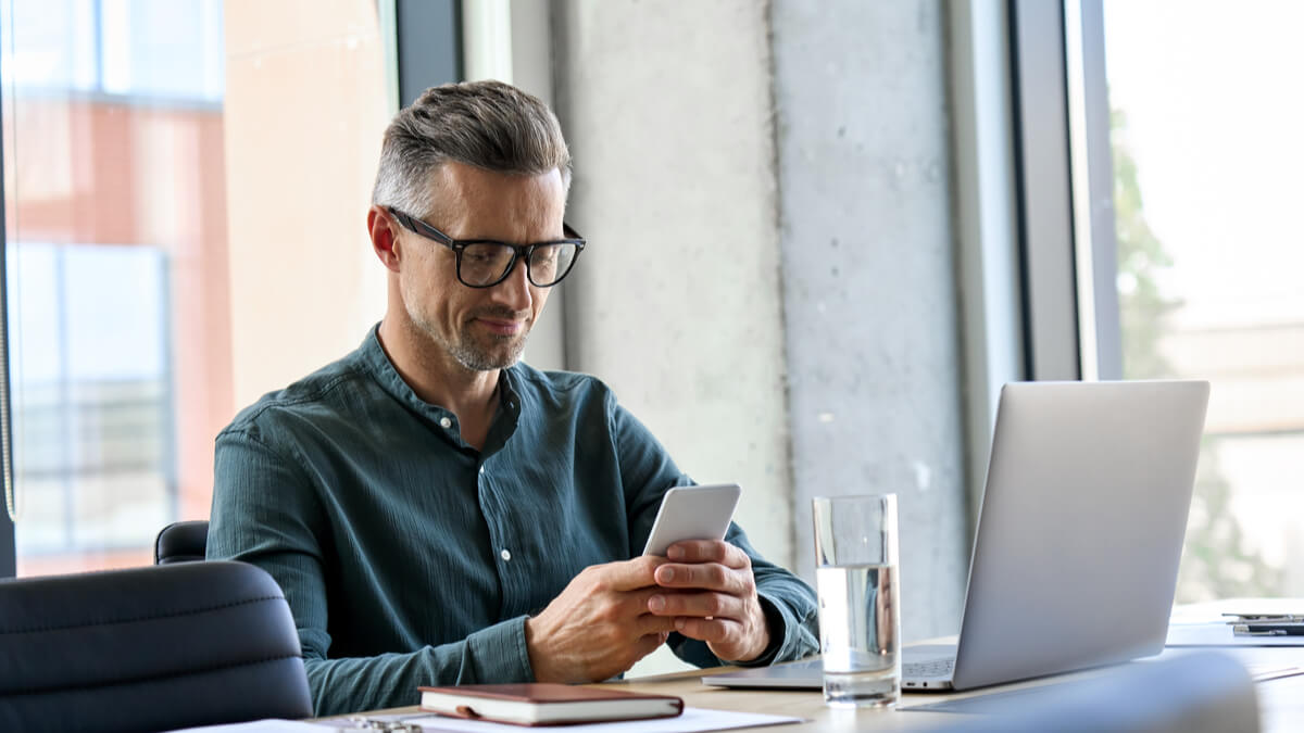 man-working-on-cellphone
