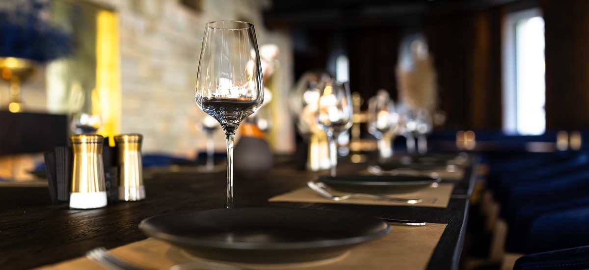 wine glass and table setting in a fine dining restaurant