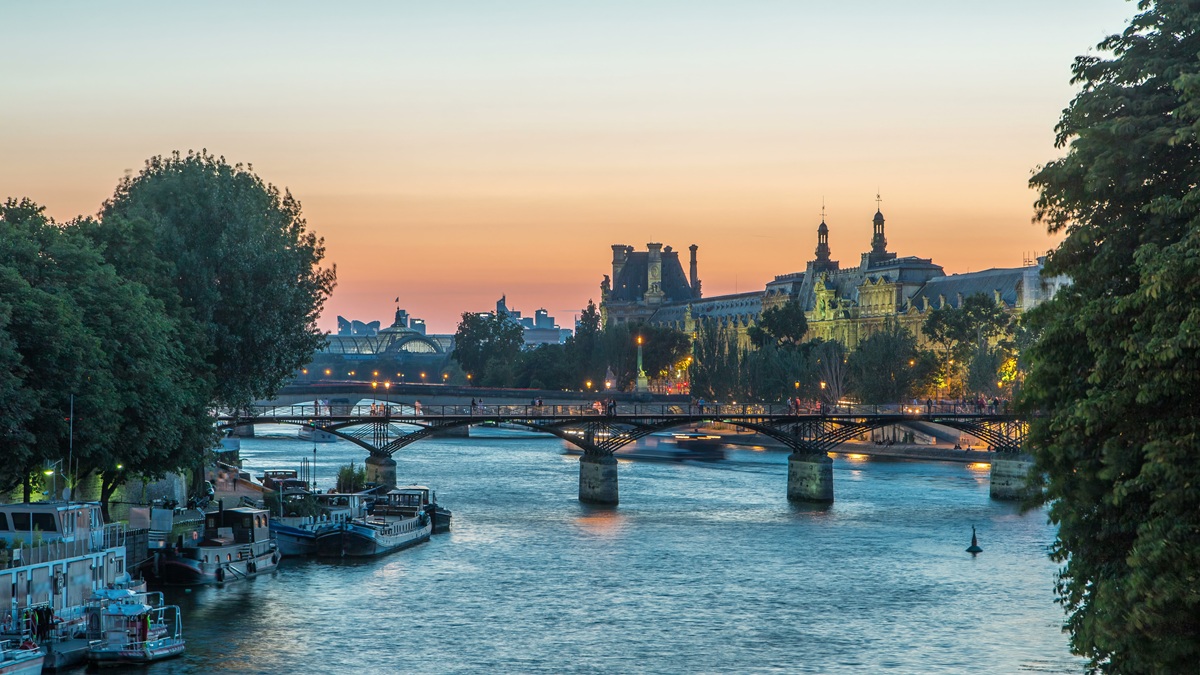 View of Paris from the river at dusk