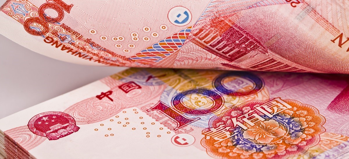 Close up of a wad of 100 Chinese Yuan banknotes