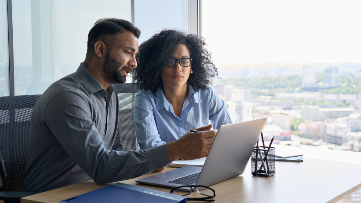 man-and-woman-working-in-front-of-laptop