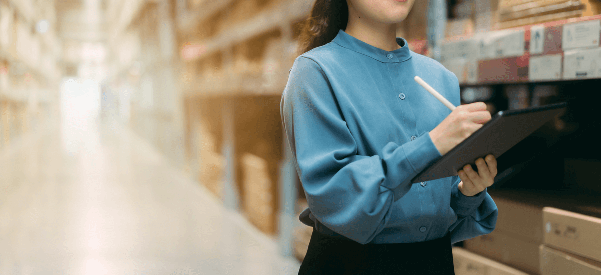 woman-in-depot-holding-tablet