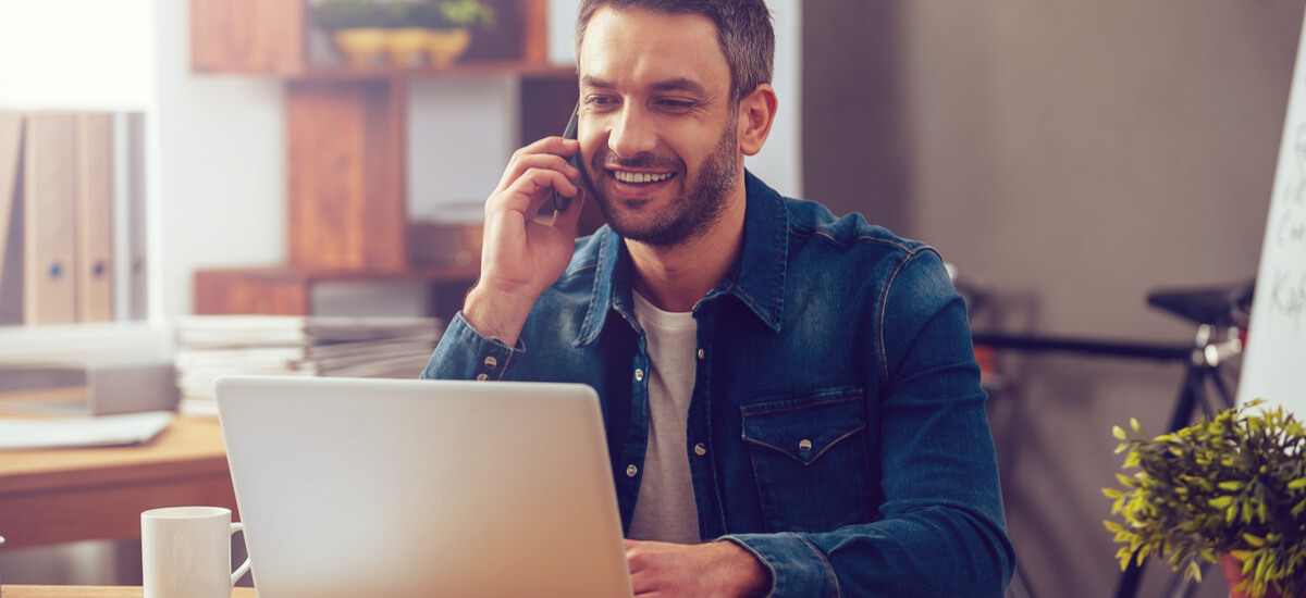 business-man-on-the-phone-with-laptop
