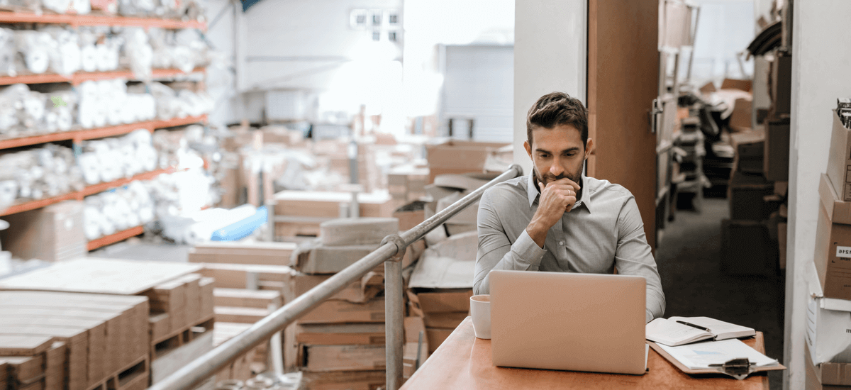 man-with-laptop-and-inventory