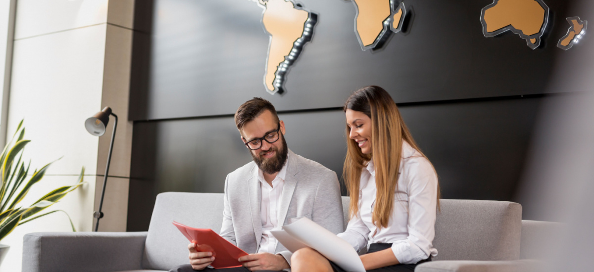 Two people using JPMorgan Chase account for international business