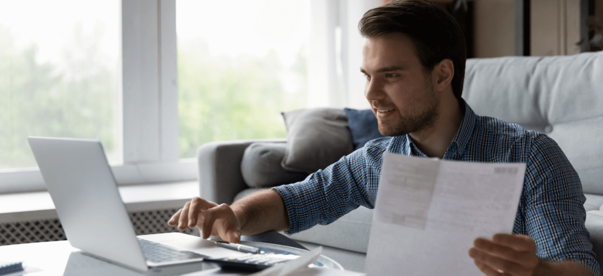 Man checking personal and business accounts