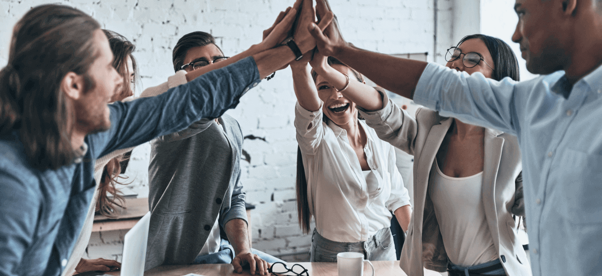 high-five-business-colleagues
