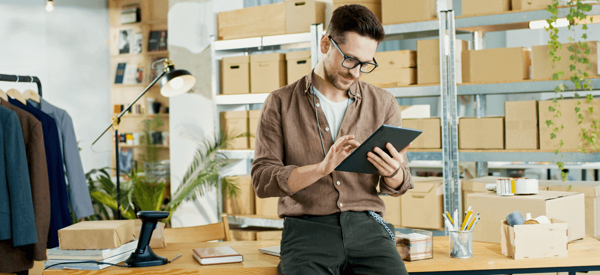 businessman-with-inventory-and-tablet