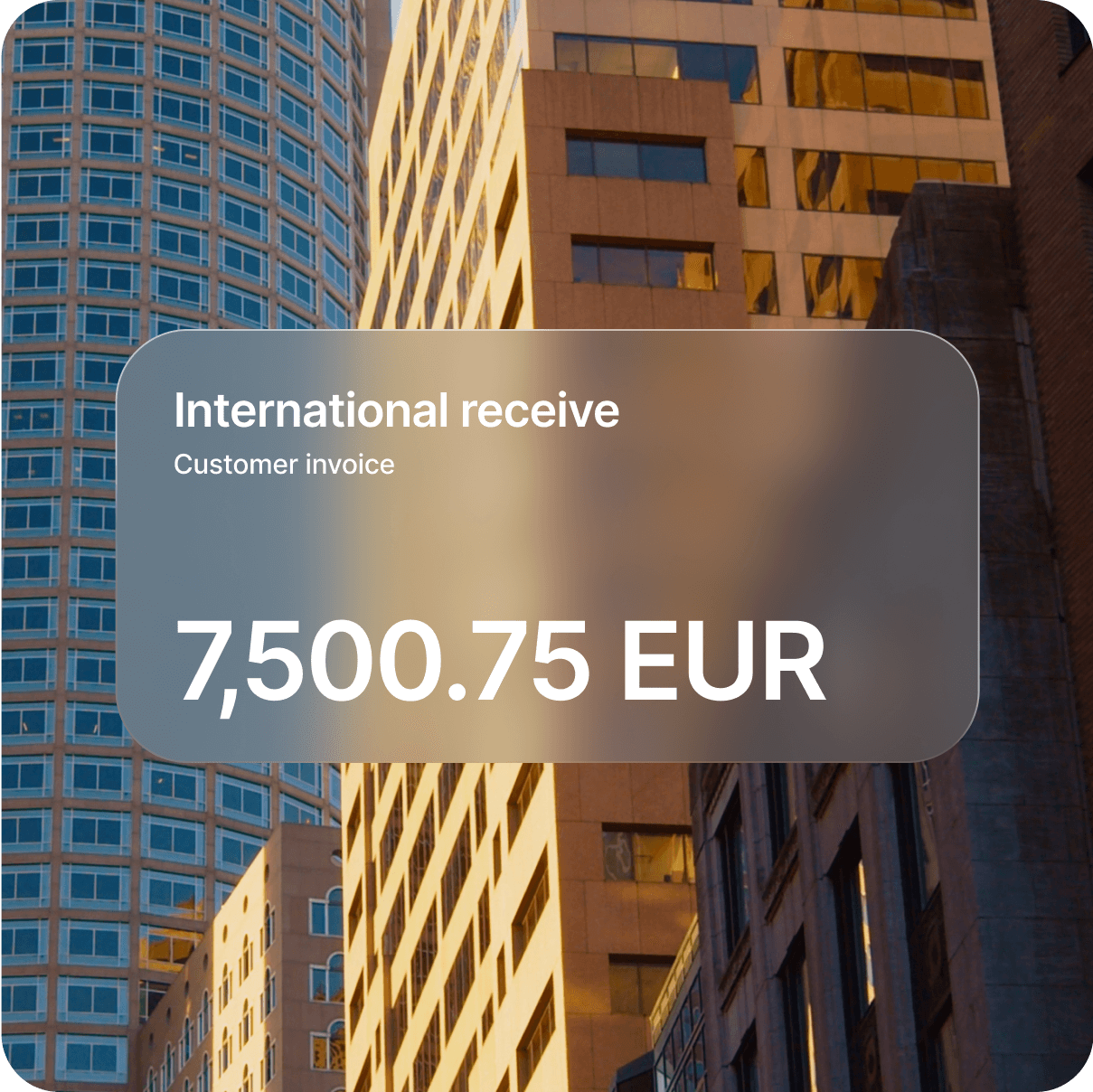 A translucent notification overlaying an architectural backdrop, it indicates a customer invoice paid.